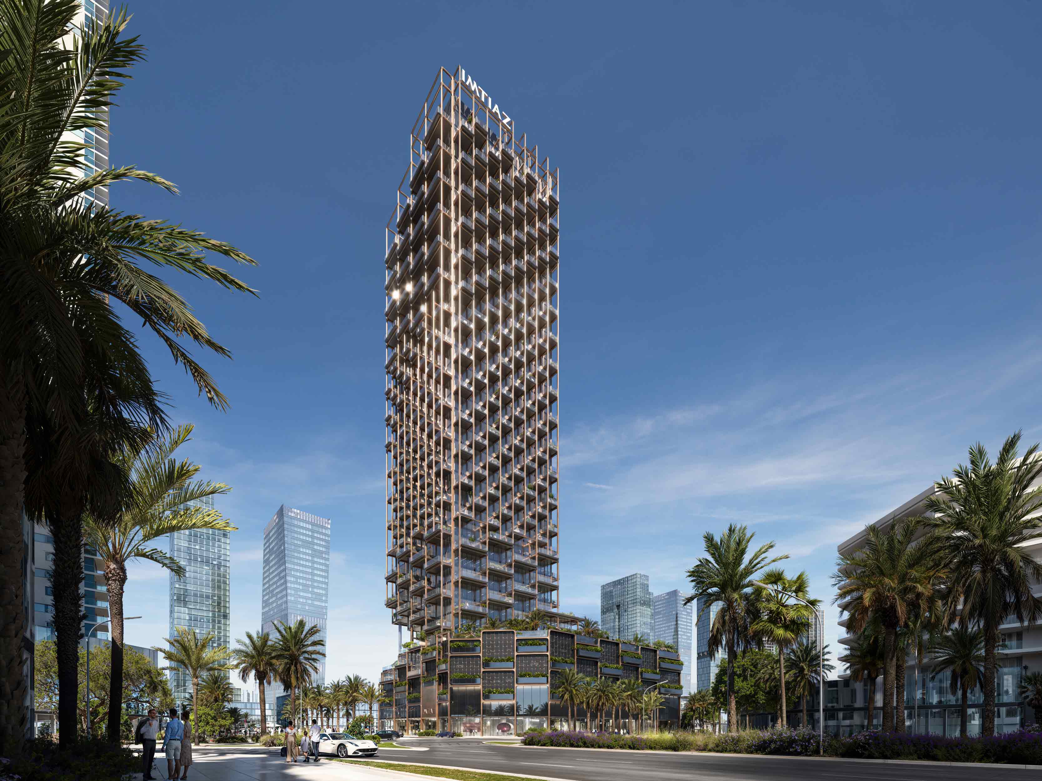 The Symphony By Imtiaz A modern skyscraper featuring greenery and palm trees, surrounded by glass buildings under a blue sky.